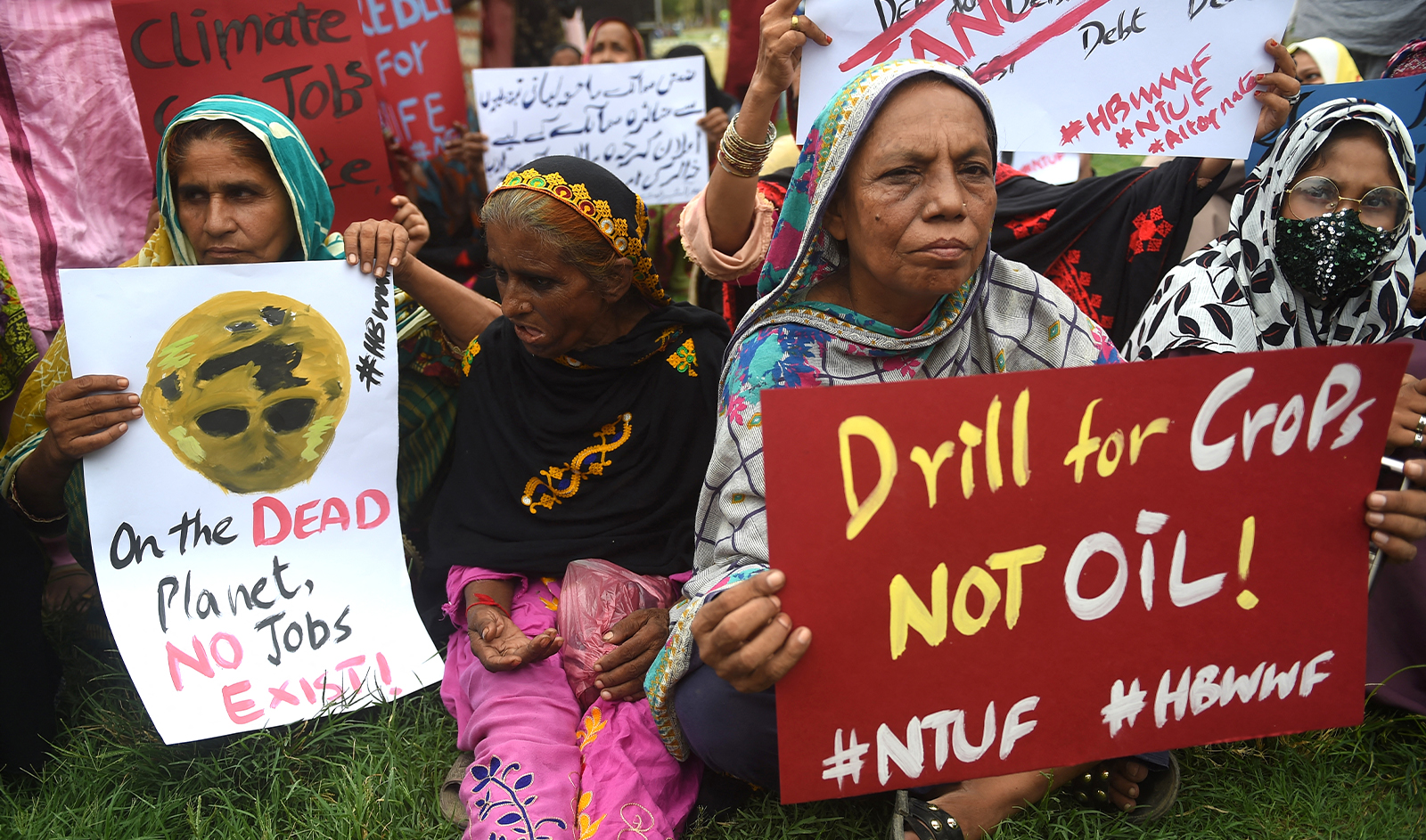 Civil society activists take part in a climate march in Karachi on July 16, 2023. (AFP/File)