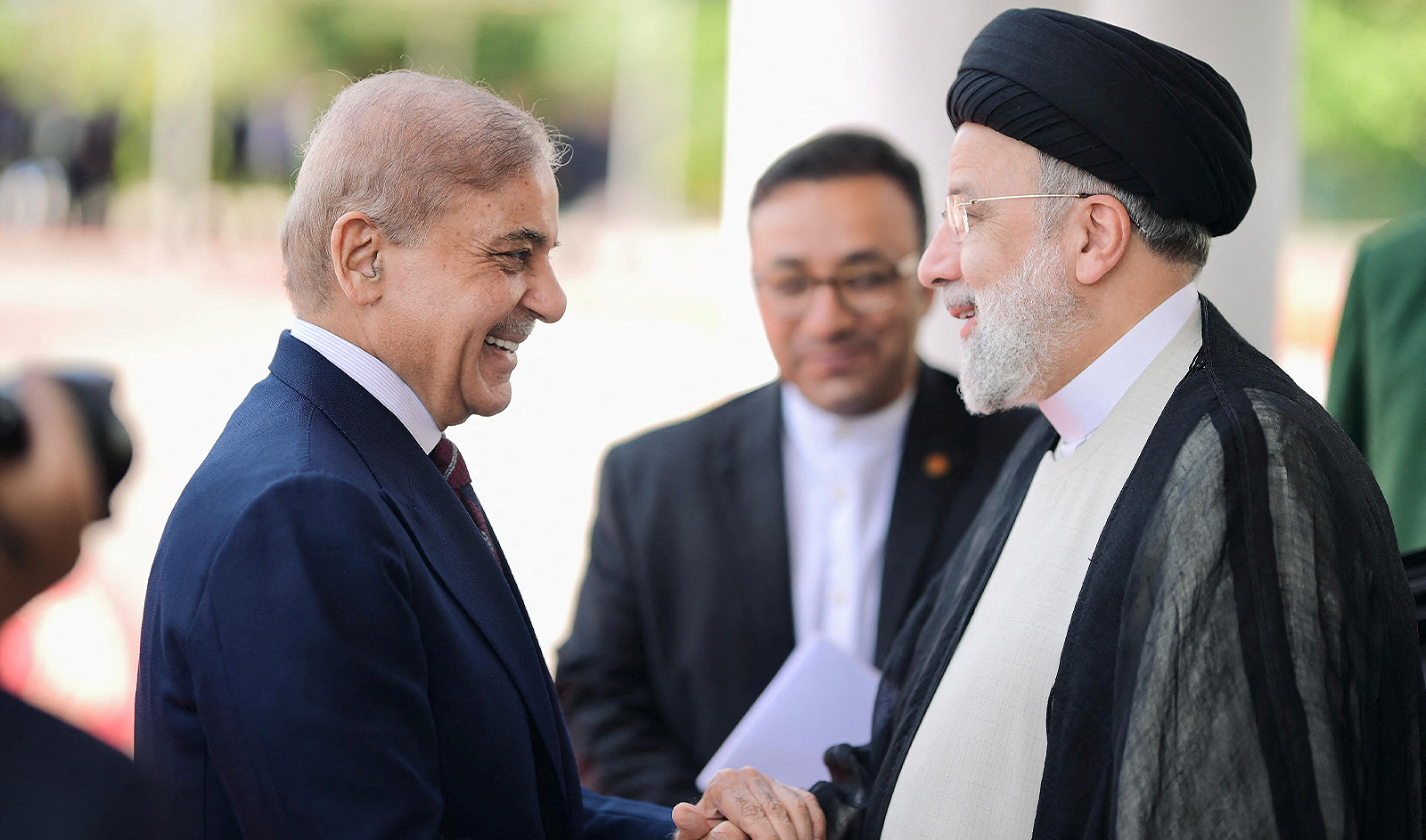 Pakistan's Prime Minister Shehbaz Sharif greets Iranian President Ebrahim Raisi on his three-day official visit in Islamabad, Pakistan April 22, 2024. (PM Office)