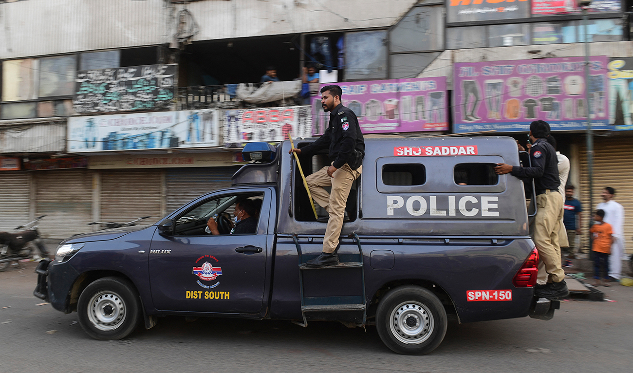 Police patrol in a market area after the authorities imposed an evening lockdown to curb the spread of the Covid-19 coronavirus in Karachi on May 24, 2021. (AFP/File)