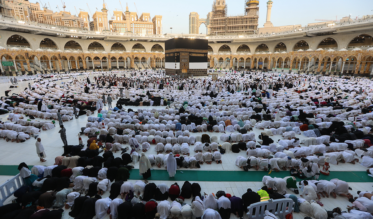 Muslim pilgrims gather around the Kaaba, Islam's holiest shrine, as they perform Eid Al-Adha morning prayers in Mecca, on June 28, 2023. (AFP/File)