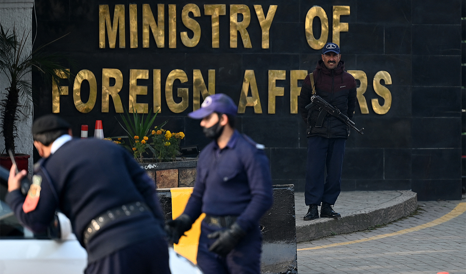 Pakistani police officers stand guard outside the Ministry of Foreign Affairs in Islamabad on January 18, 2024. (AFP/File)