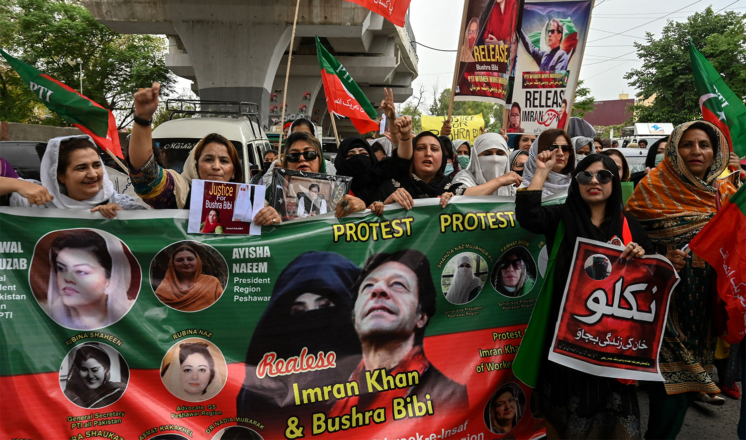 Supporters of Pakistan Tehreek-e-Insaf (PTI) party and former Pakistan's Prime Minister Imran Khan shout slogans as they take part in a protest rally for the release of their leader Khan, in Peshawar on April 26, 2024. (AFP)