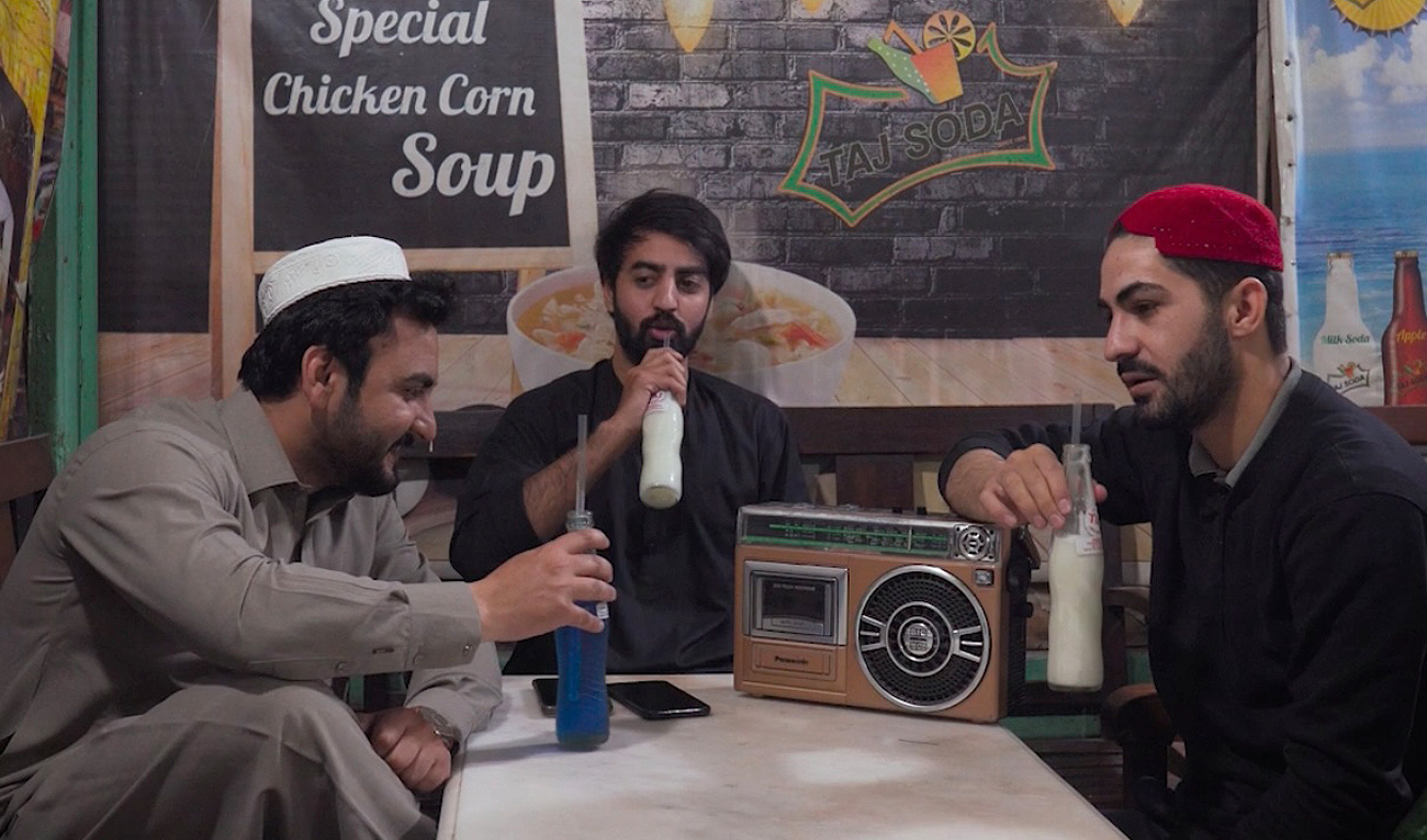 In this photo, provided with the courtesy of Syed Bilal, customers take sip of a soda at popular Taj Soda shop in Peshawar on March 18, 2024. (Photo courtesy: Instagram/@syed_bilalreels)