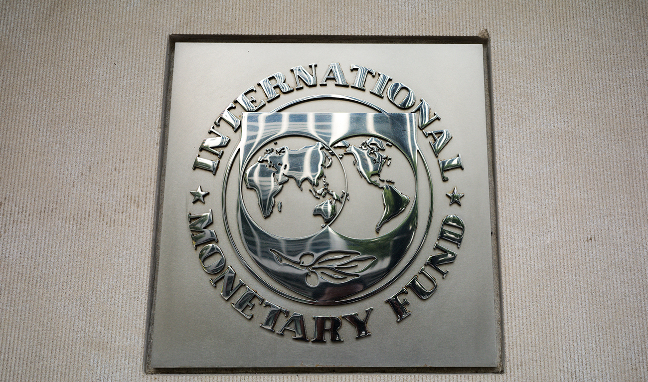 The seal of the International Monetary Fund is seen outside of its headquarters in Washington, DC on October 7, 2021. The annual meetings are running from October 11-17, 2021. (AFP/File)