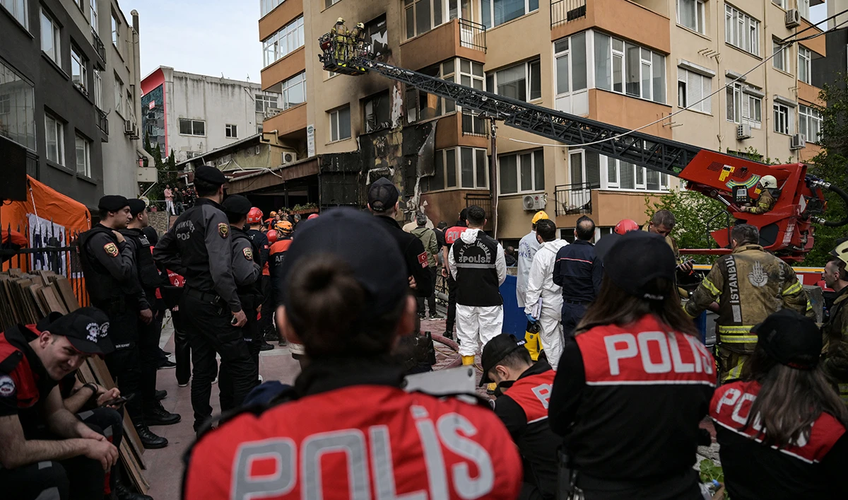 Emergency personnel intervene at the site of a fire in a residential building in Istanbul on April 2, 2024. (AFP)