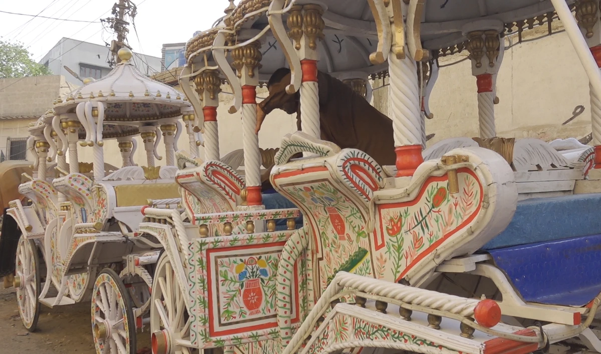 Fazal Aman cleans his British-style Victoria carriage in the Soldier Bazaar area of Karachi, Pakistan on April 6, 2024. (AN Photo)
