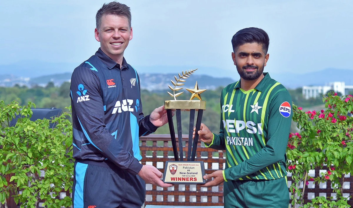 Pakistan’s white-ball captain Babar Azam (right) and New Zealand's captain, Michael Bracewell, hold the trophy ahead of the five-match T20I series between the two teams in Rawalpindi, Pakistan on April 17, 2024. (Pakistan Cricket Board)