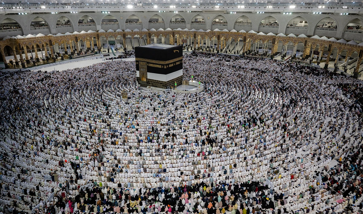 In this handout picture provided by the Saudi Press Agency (SPA) on June 29, 2023, Muslim pilgrims gather around the Kaaba, Islam's holiest shrine, at the Grand Mosque in the holy city of Mecca, on the second day of Eid Al-Adha that ends the Hajj pilgrimage. (AFP/File)