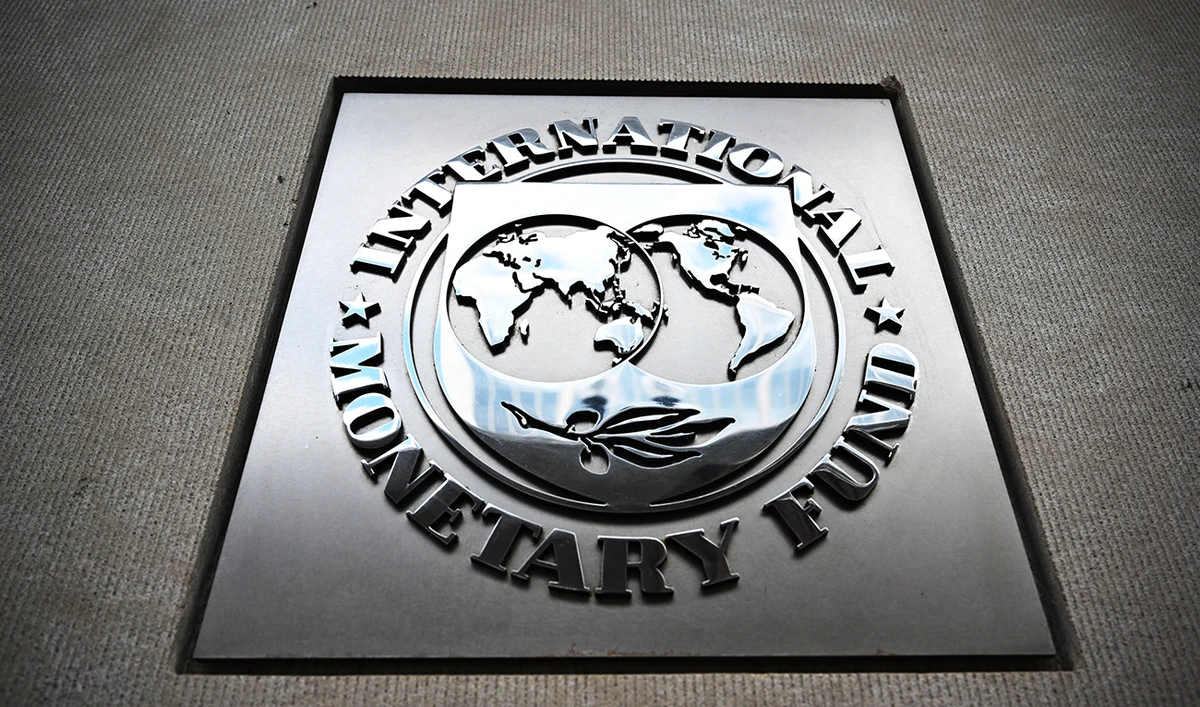 The seal of the International Monetary Fund is at the headquarters building in Washington, DC, April 12, 2024. (AFP/File)