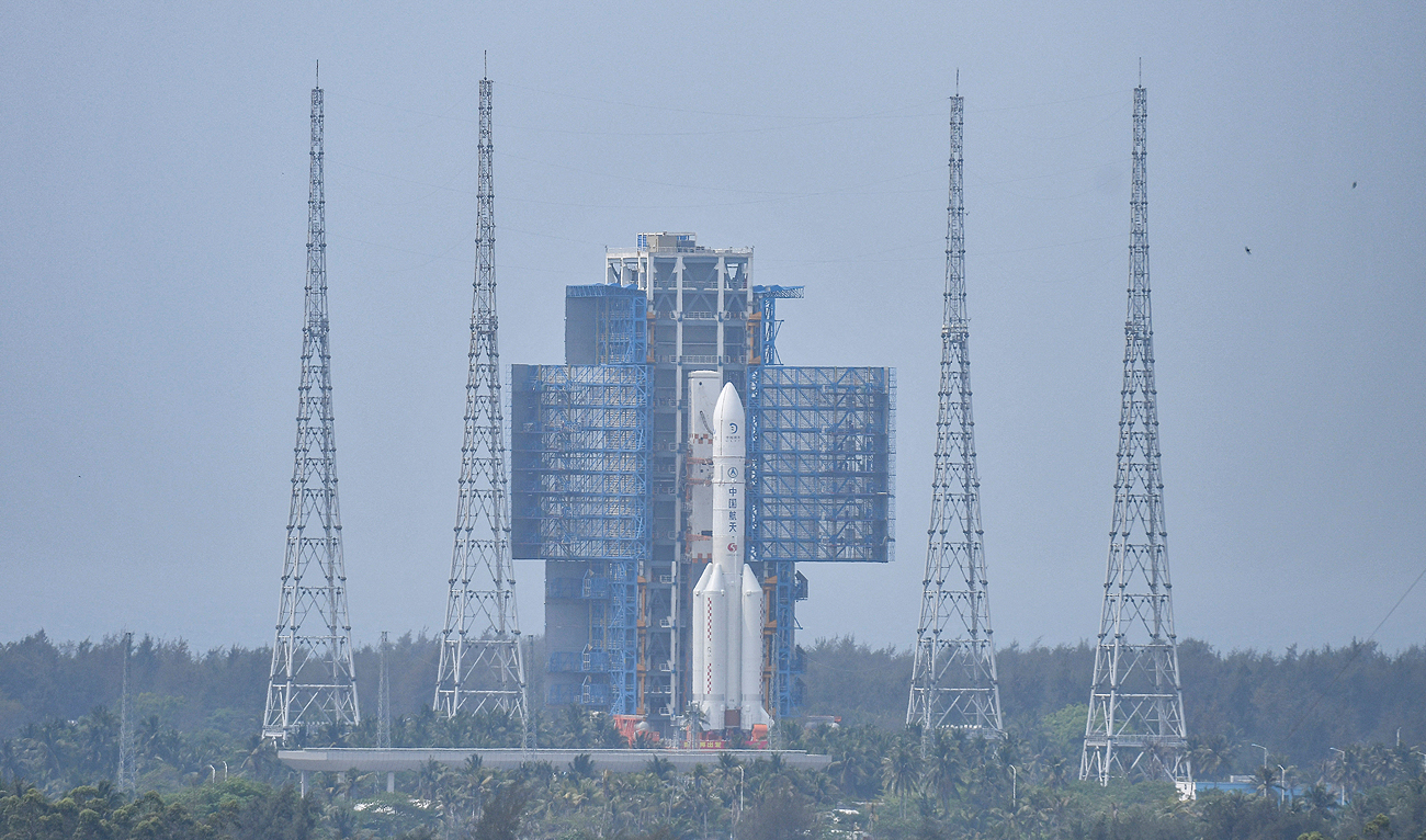 The Chang’e 6 lunar probe and the Long March-5 Y8 carrier rocket combination sit atop the launch pad at the Wenchang Space Launch Site in Hainan province, China April 27, 2024. (CNS Photo via REUTERS)