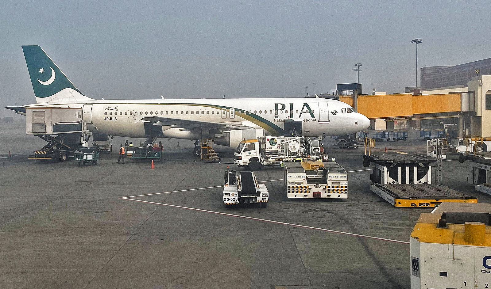 View of a Pakistan International Airlines (PIA) passengers plane, taken through a glass panel, at the Allama Iqbal International Airpor in Lahore, Pakistan on January 29, 2024. (REUTERS/File)