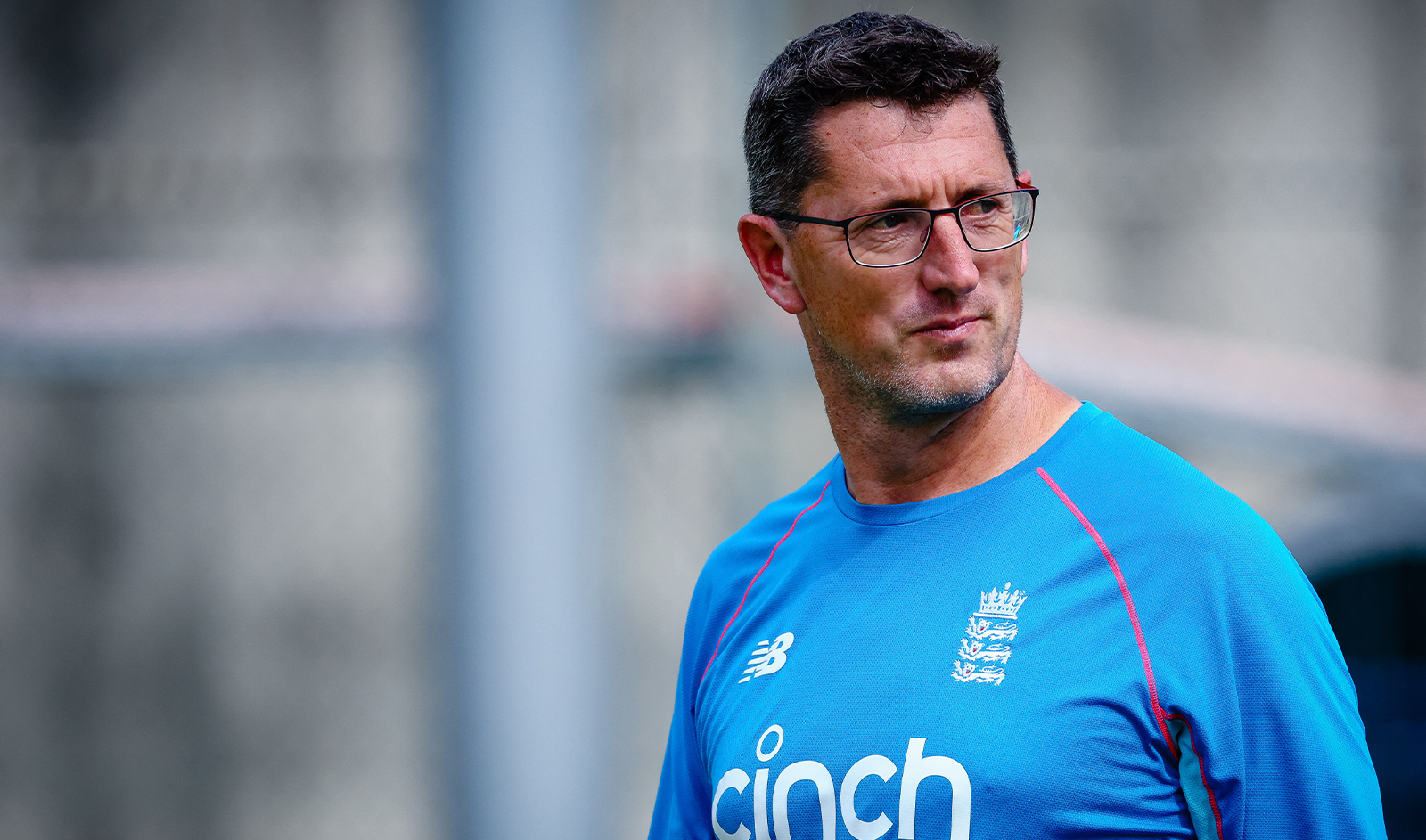 England Women’s cricket coach Jon Lewis looks on during a net training session at the Gabba in Brisbane on December 6, 2021, ahead of the opening Ashes Test cricket match against Australia. (AFP/File)