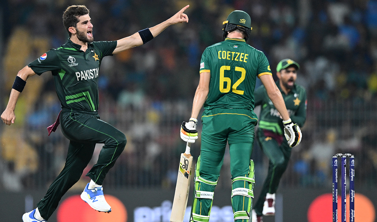Pakistan's Shaheen Shah Afridi (L) celebrates after taking the wicket of South Africa's Gerald Coetzee (C) during the 2023 ICC Men's Cricket World Cup one-day international (ODI) match between Pakistan and South Africa at the MA Chidambaram Stadium in Chennai on October 27, 2023. (AFP/File)