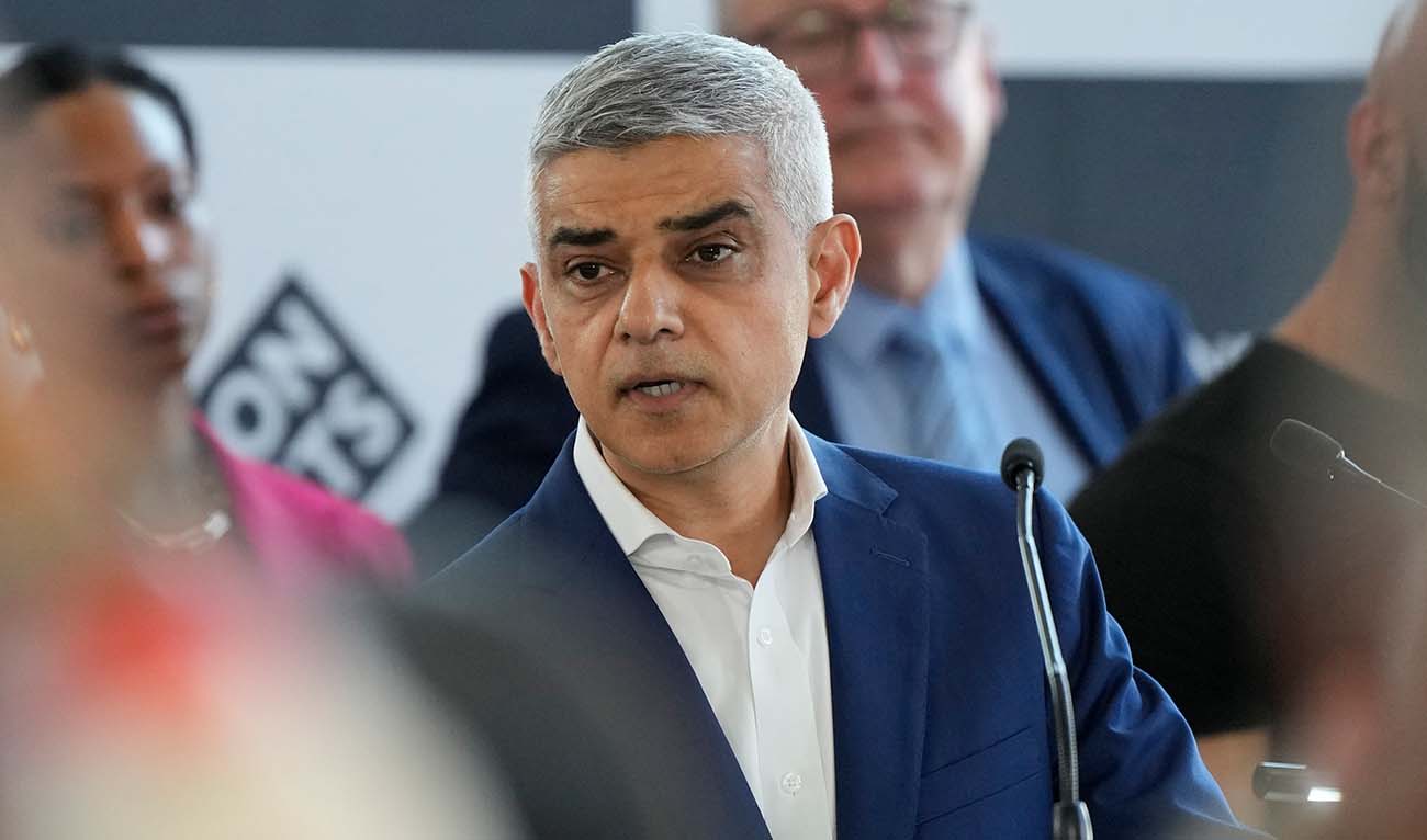 Sadiq Khan makes a speech after he is re-elected for a record third time as Mayor of London, following the counting of votes, at City Hall in London, Saturday, May 4, 2024. (AFP)