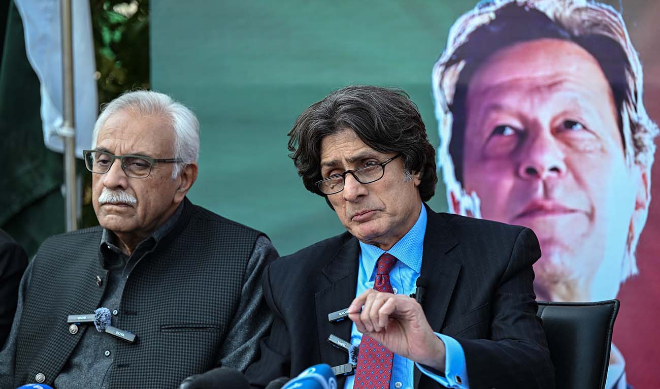 Leaders of Pakistan Tehreek-e-Insaf (PTI) party Raoof Hasan along with Ahmad Awais (L) speaks during a press conference in Islamabad on February 6, 2024. (AFP/File)