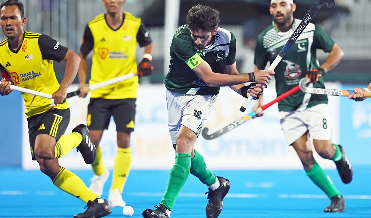 In this file photograph, taken on January 18, 2024, Pakistan Hockey Team Captain Ammad Butt plays a shot during a match against Malaysia in the Hockey Olympics Qualifier 2024 in Oman. (Photo courtesy: International Hockey Federation/File)