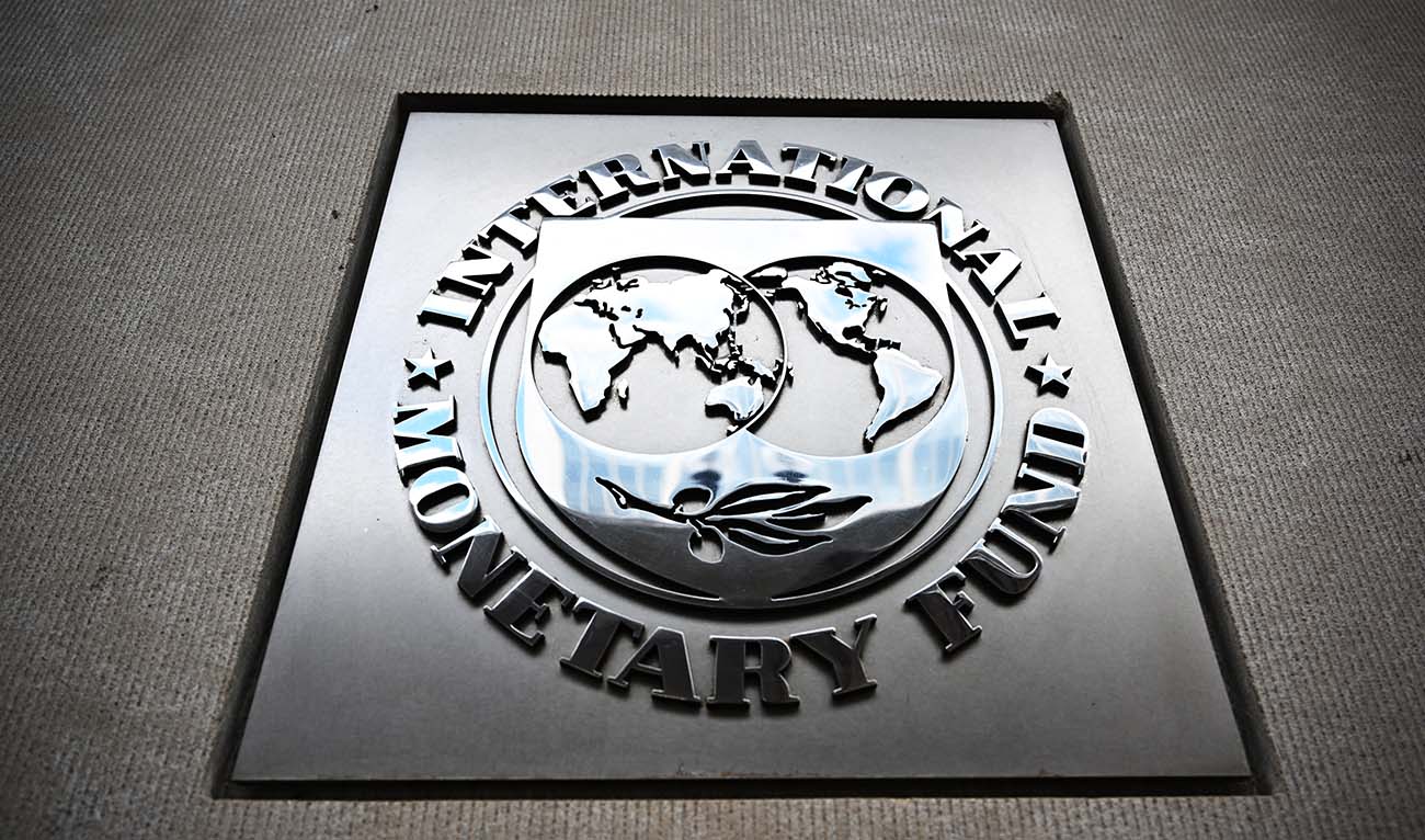 The seal of the International Monetary Fund is at the headquarters building in Washington, DC, April 12, 2024, in Washington, DC. (AFP/File)