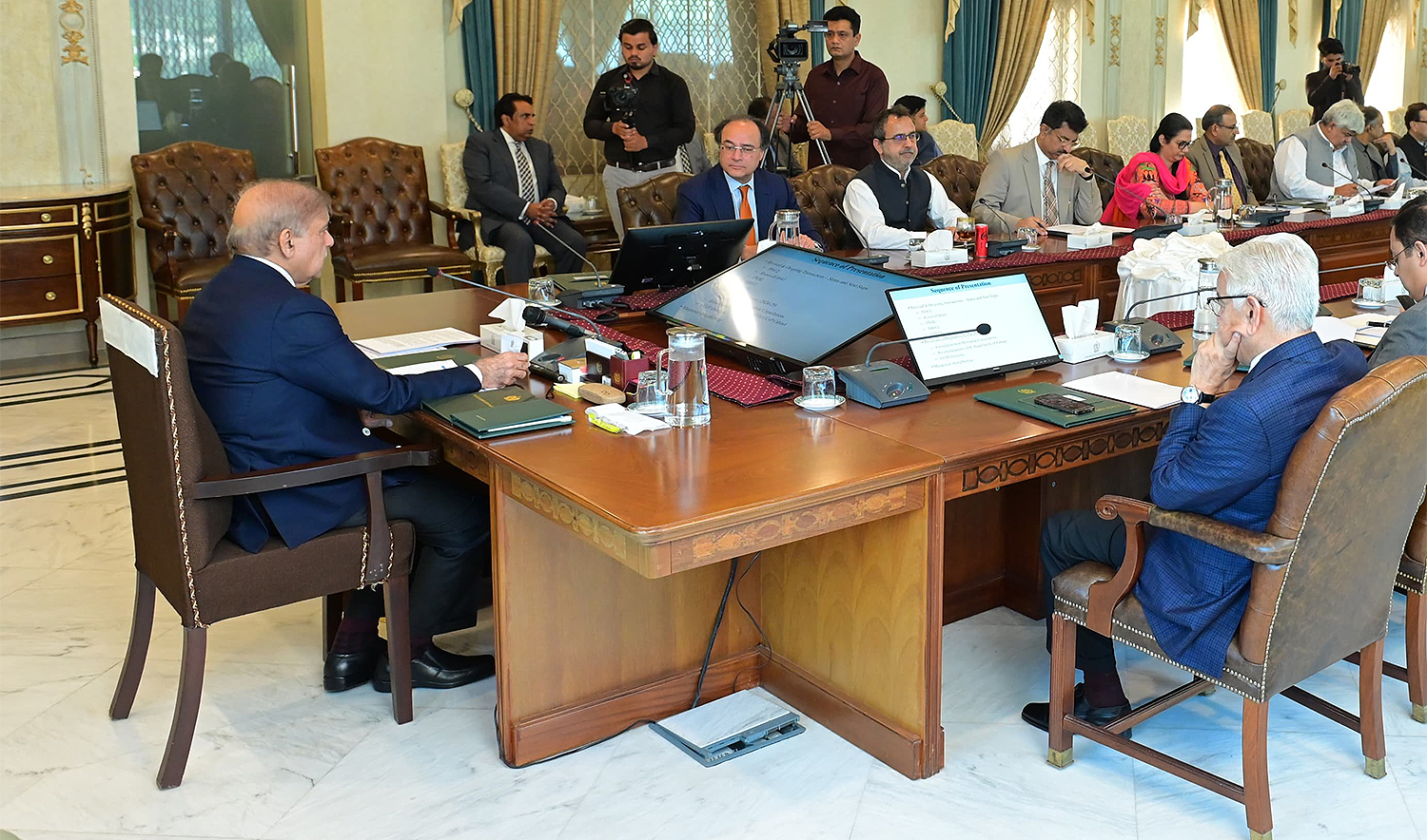 Pakistan Prime Minister Shehbaz Sharif (left) chairs a meeting of the Cabinet Committee on Privatization in Islamabad, Pakistan on May 14, 2024. (PTV News)