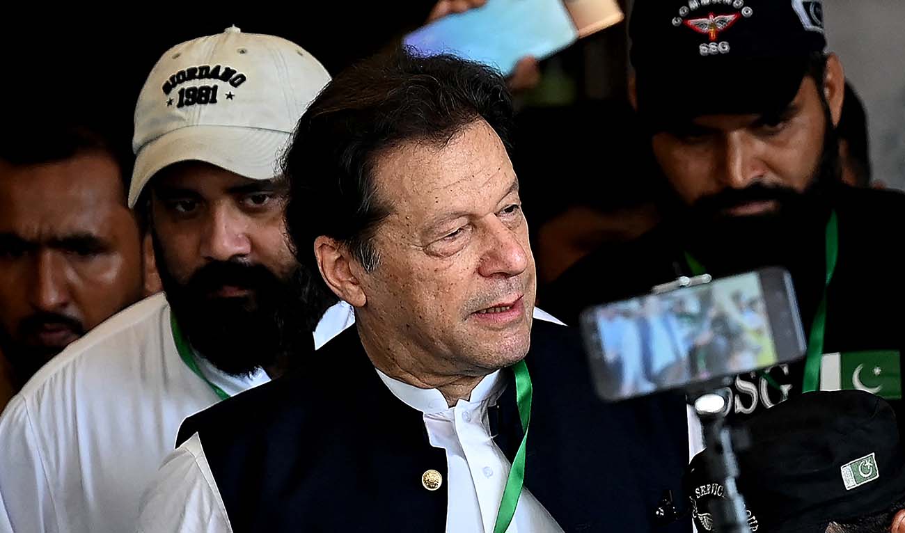 Pakistan's former Prime Minister Imran Khan (C) leaves after appearing in the Supreme Court in Islamabad on July 26, 2023. (AFP/File)