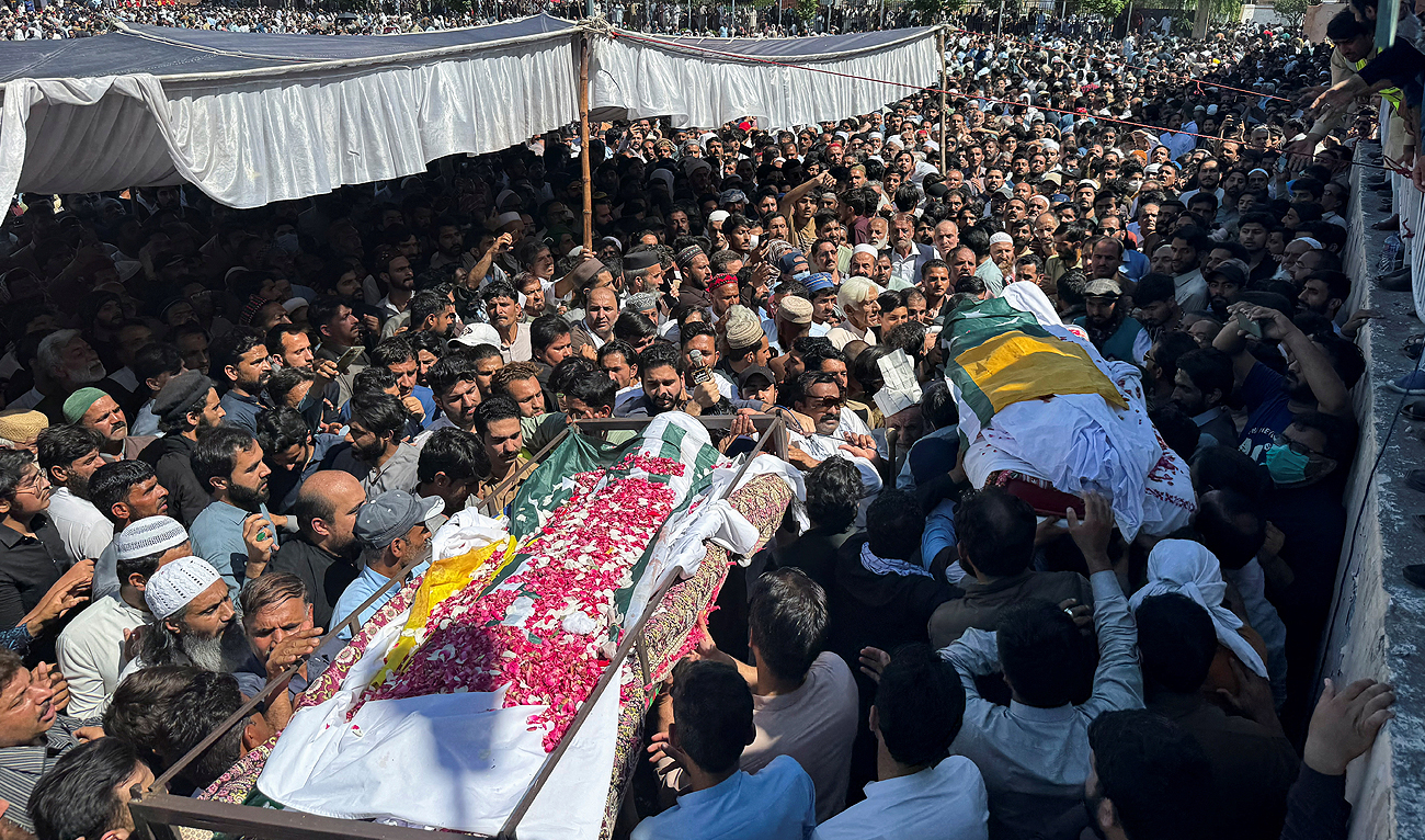 People attending the funeral of people who were killed during a protest by an alliance of civil rights groups, demanding the subsidy on electricity and wheat prices in the face of rising inflation, in Muzaffarabad, Pakistan-ruled Kashmiri, Pakistan May 14, 2024. (REUTERS)