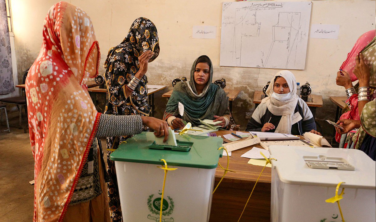 Pakistan’s women cast their ballots to vote during national elections, at a polling station in Multan on February 8, 2024. (AFP/File)