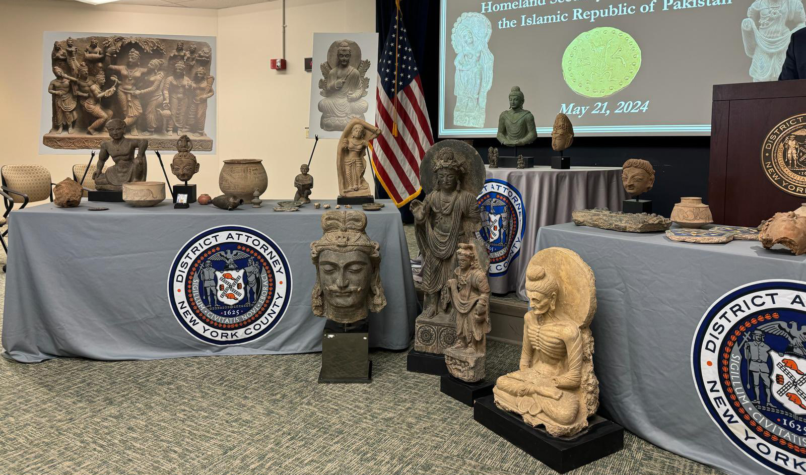 Recovered Pakistani artifacts are displayed during a ceremony at the Manhattan District Attorney’s office in New York, US, on May 21, 2024. (@PakinNewYork/X)
