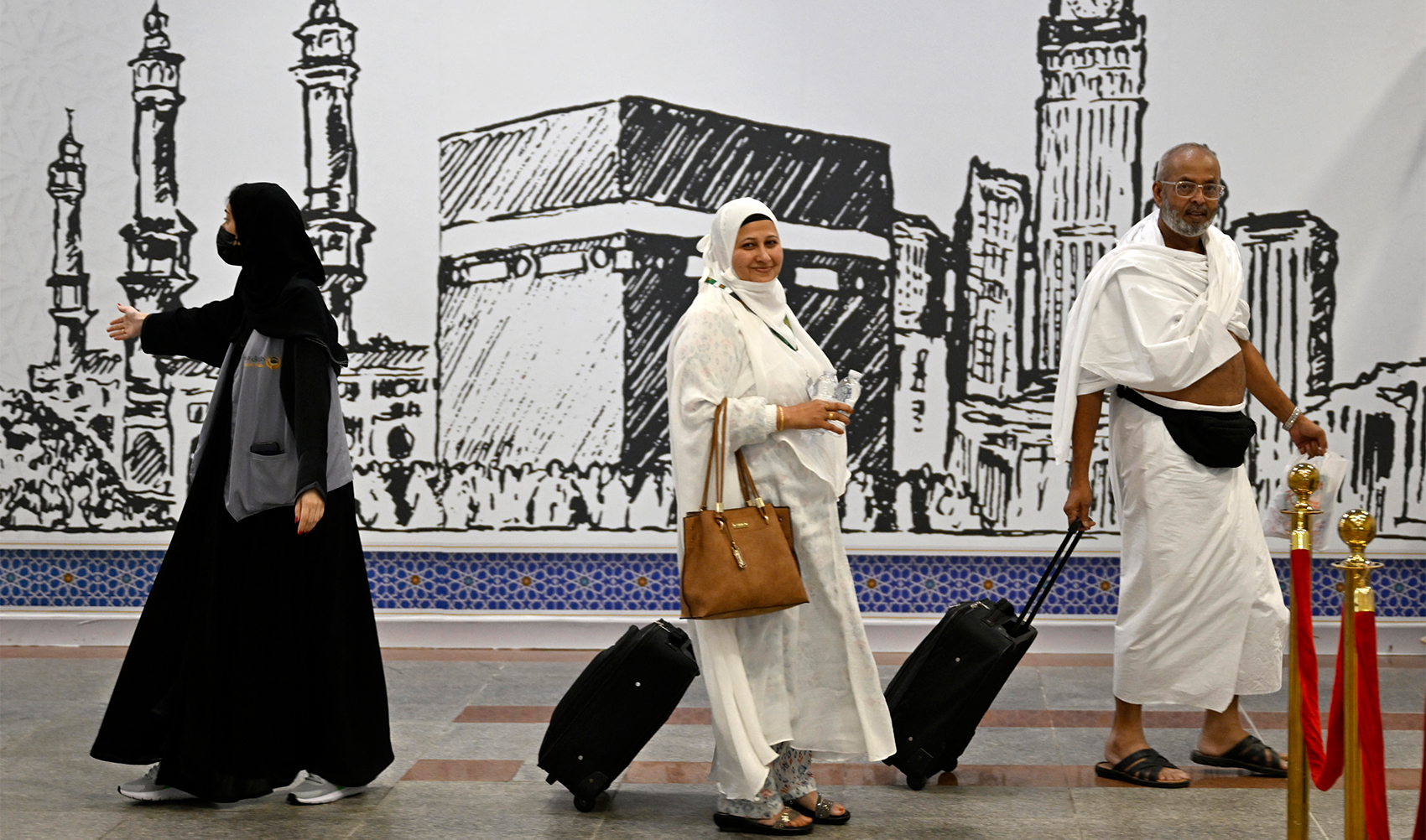 Muslim pilgrims arrive at King Abdul Aziz International Airport in Jeddah, ahead of the Hajj pilgrimage in Mecca, on May 10, 2024. (AFP/File)