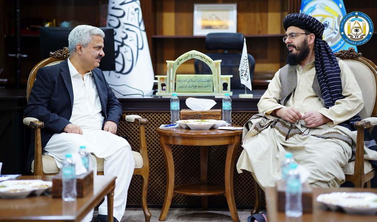 In this handout photograph, taken and released by Afghan Interior Ministry, Pakistan’s Secretary Interior Muhammad Khurram Agha (left) talks with Taliban Deputy Minister for Interior Muhammad Nabi Omari in Kabul on May 30, 2024. (Photo courtesy: X/@moiafghanistan)