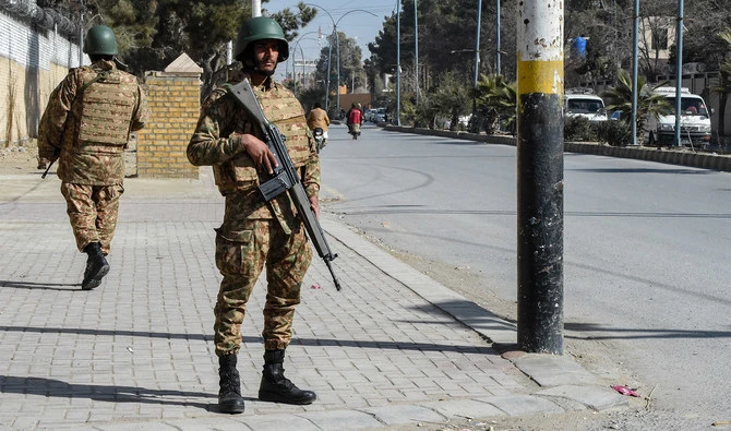 Pakistani army personnel stand guard along a road in Quetta on February 7, 2024. (AFP/File)