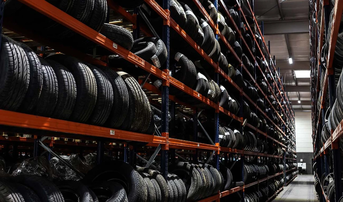 In this photograph taken on on October 6, 2022 reusable tyres removed from damaged cars are stocked at the "Surplus Recyclage" company in Gaillac, southwestern France. (AFP/File)