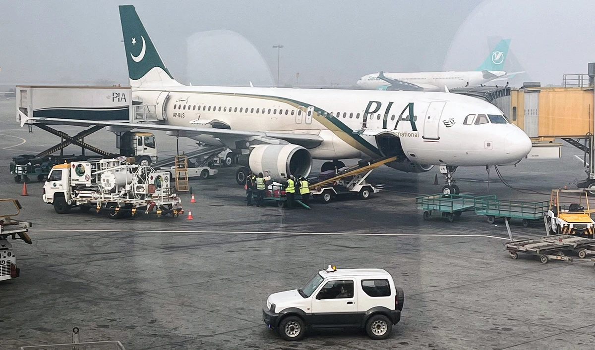View of a Pakistan International Airlines (PIA) passengers plane, taken through a glass panel, at the Allama Iqbal International Airpor in Lahore, Pakistan on January 29, 2024. (REUTERS/File)