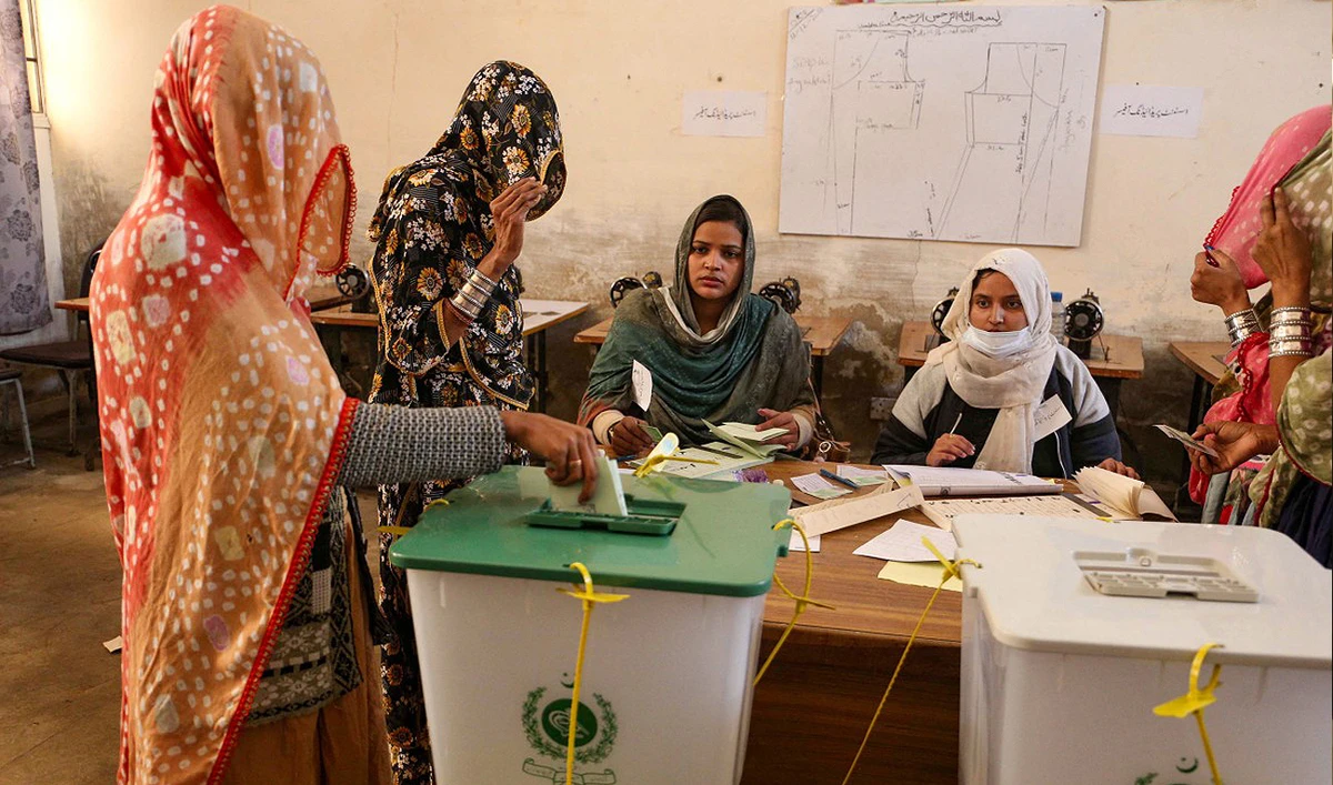 Pakistan’s women cast their ballots to vote during national elections, at a polling station in Multan on February 8, 2024. (AFP/File)