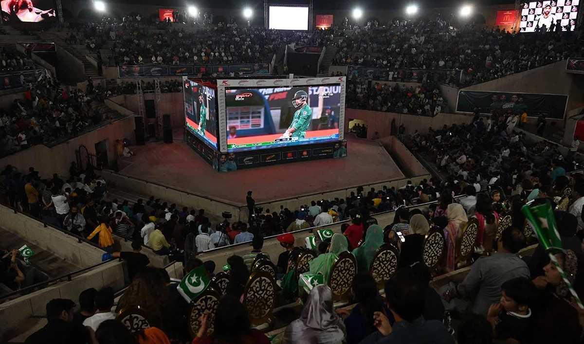 Cricket fans watch the live telecast of the Asia Cup Twenty20 international cricket match between India and Pakistan in Dubai, on big screens in Lahore on August 28, 2022. (AFP/File)