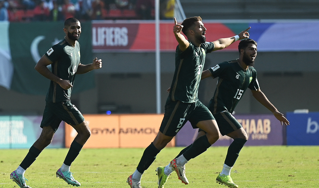 Pakistan's players celebrate after scoring a goal during the 2026 FIFA World Cup qualifier football match between Pakistan and Tajikistan at the Jinnah Sports stadium in Islamabad on November 21, 2023. (AFP/File)