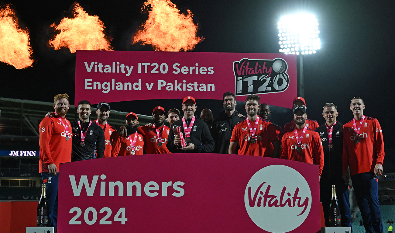 England's Jos Buttler holds the trophy as England players celebrate their series win after England win the fourth T20 international cricket match between England and Pakistan at The Oval, in London on May 30, 2024. (AFP/File)