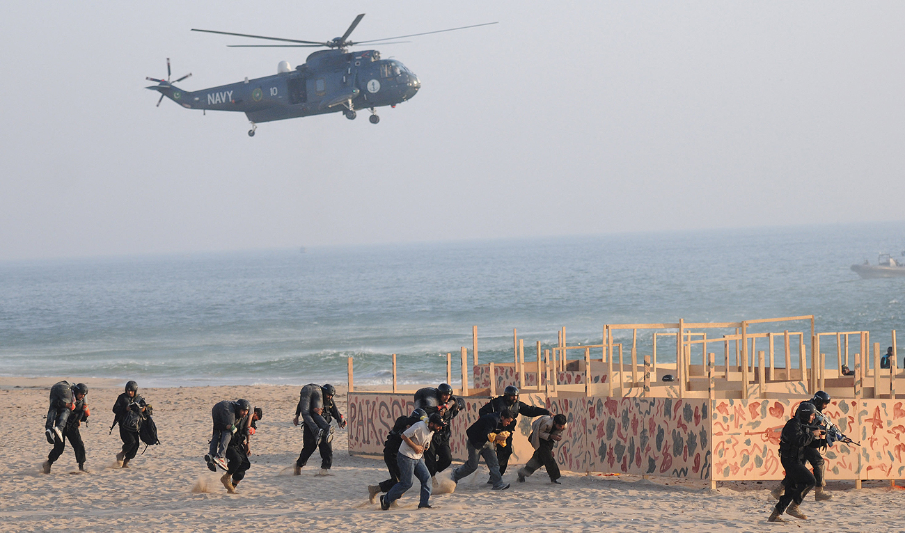 In this file photograph, taken on March 5, 2013, Pakistan Navy special forces present an impressive Maritime counter terrorism demonstration during the Multinational exercise AMAN-13 in Manora island around 30 kilometer from Karachi. (AFP/File)