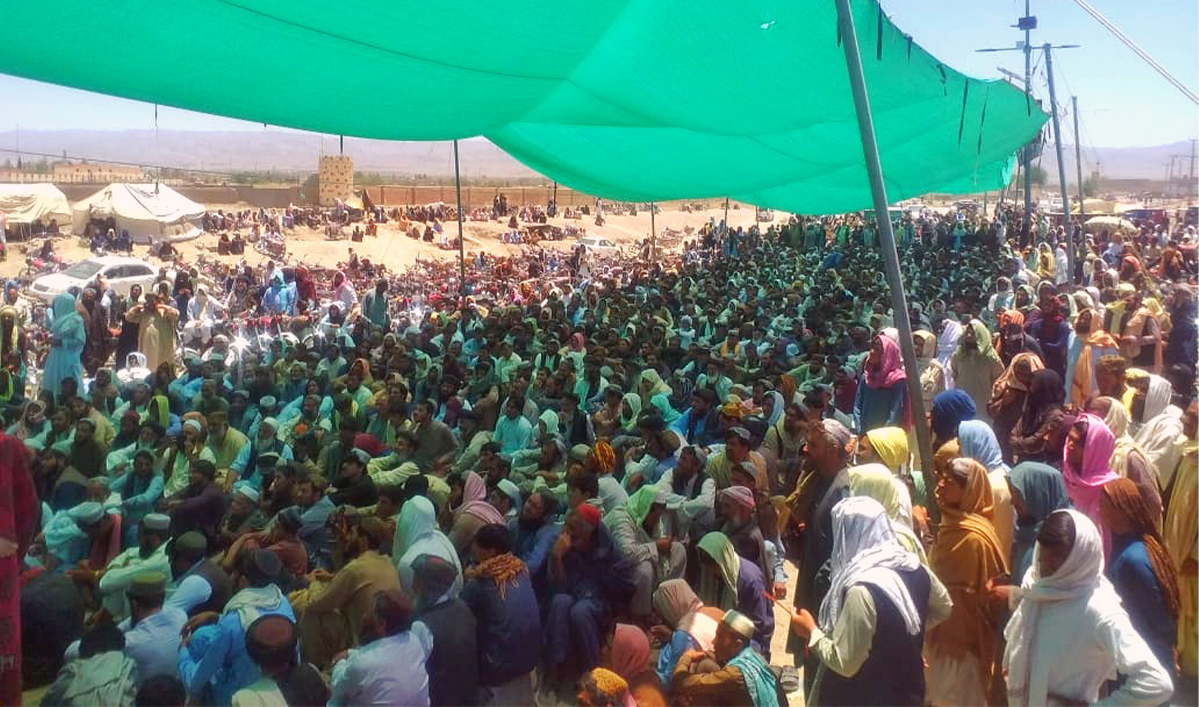 Residents take part in a sit-in protest in Pakistan’s southwestern Chaman border town on June 8, 2024, after the Pakistan government made it mandatory for all cross-border travelers to have a valid passport and visa. (AN photo by Nadeem Khan)