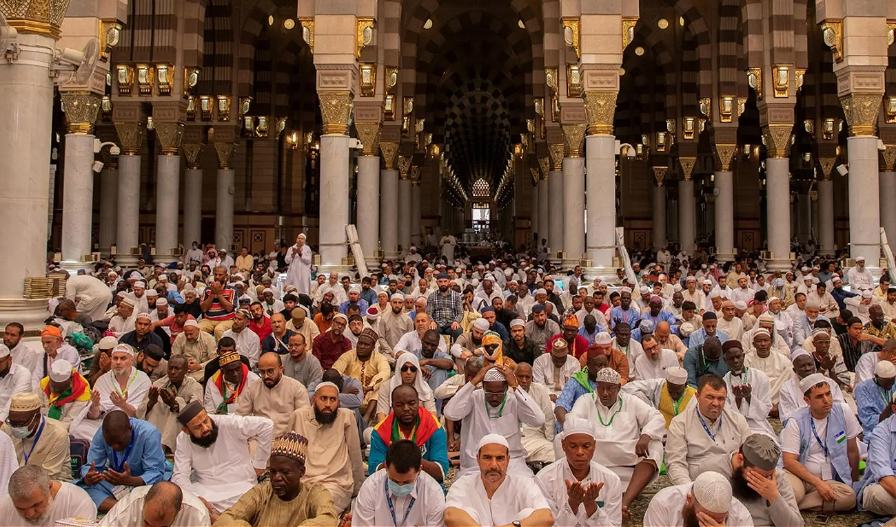In this handout photograph, taken and released by the Saudi Press Agency, people attend Friday prayers at Prophet’s Mosque in Madinah on June 7, 2024, ahead of annual Hajj pilgrimage. (SPA)
