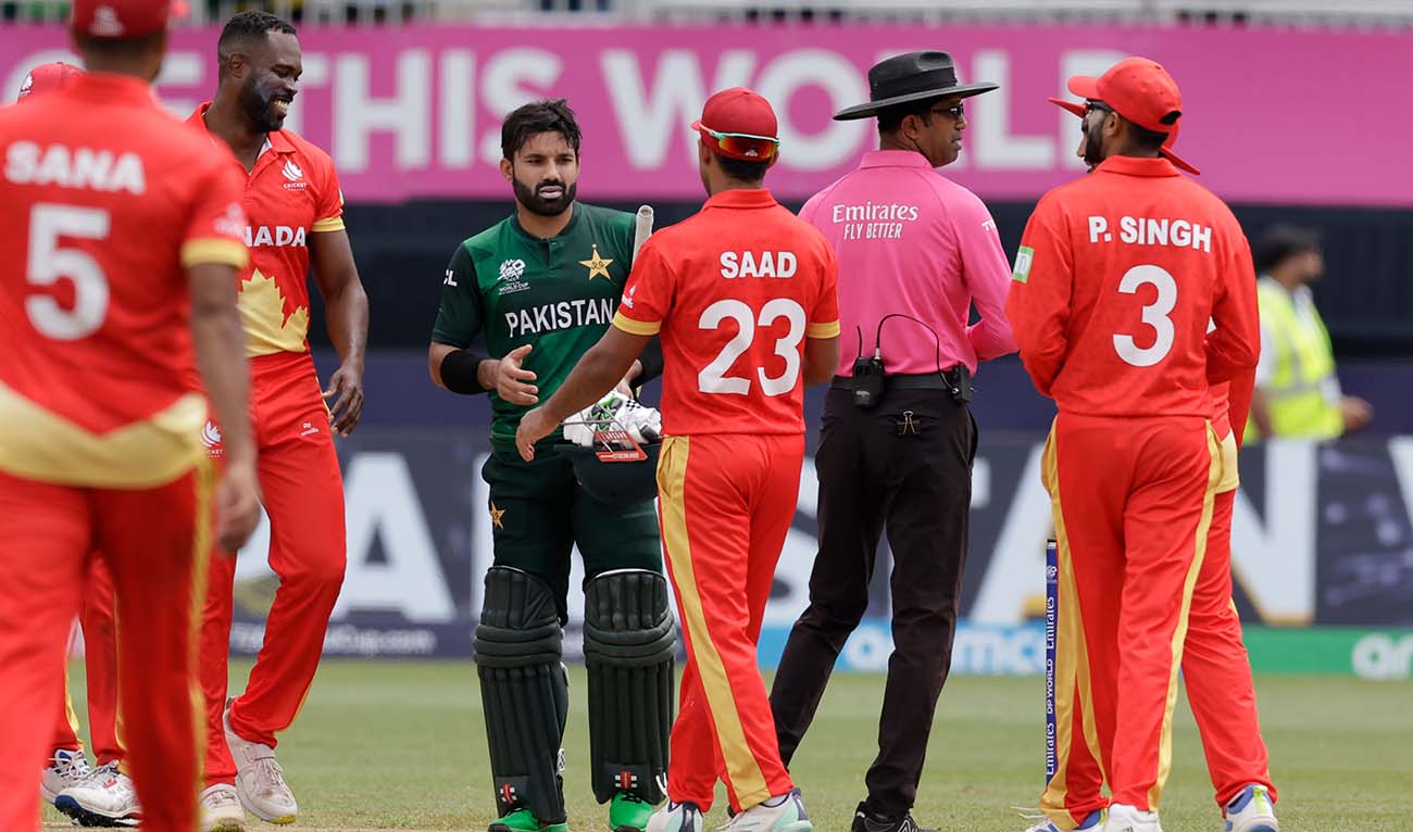 Pakistan's Mohammad Rizwan, center, and Canada's captain Saad Bin Zafar greet each other at the end of the ICC Men's T20 World Cup cricket match between Pakistan and Canada at the Nassau County International Cricket Stadium in Westbury, New York, Tuesday, June 11, 2024. (AP)