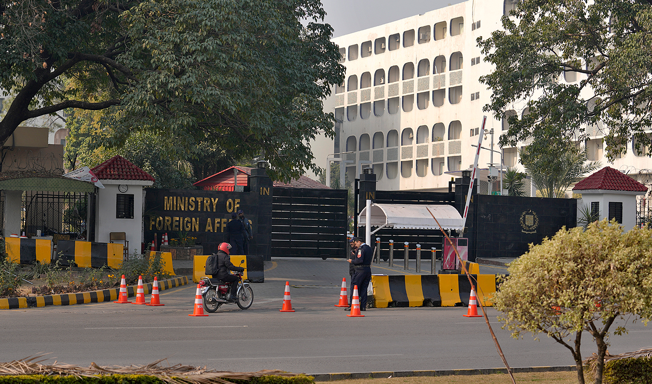 Police officers stand guard at the main entry gate of Pakistan's Ministry of Foreign Affairs, in Islamabad on January 18, 2024. (AP/File)