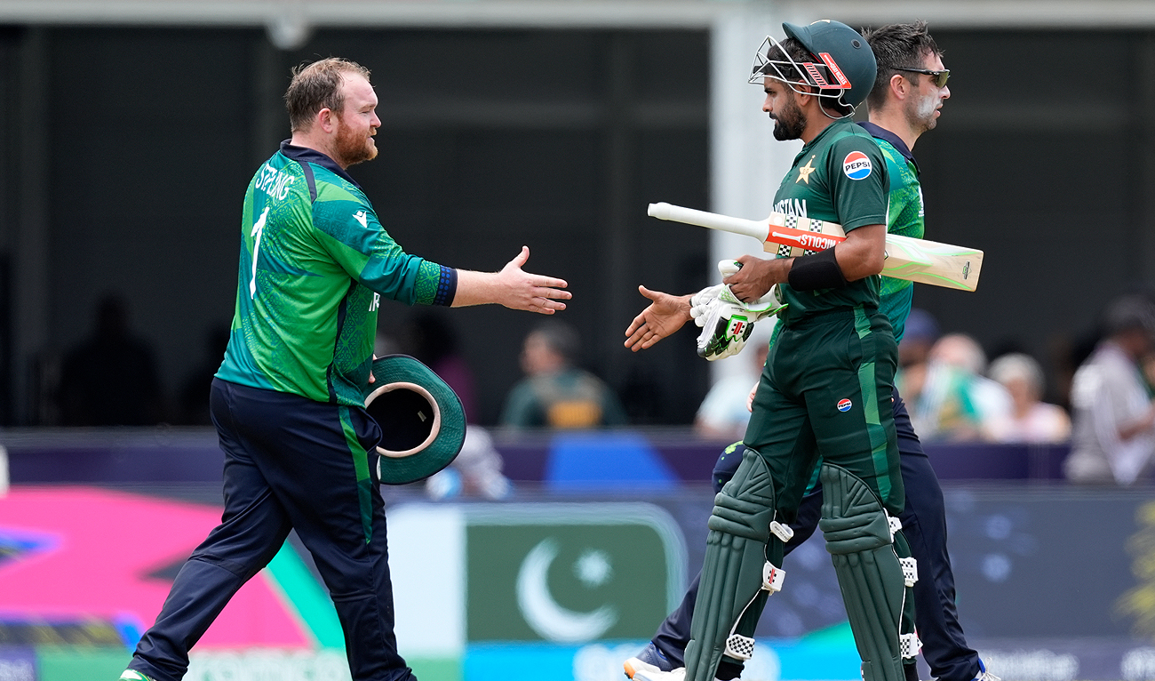 Ireland's captain Paul Stirling, left, congratulates Pakistan's captain Babar Azam after Pakistan won the ICC Men's T20 World Cup cricket match against Ireland at the Central Broward Regional Park Stadium, Lauderhill, Fla. on June 16, 2024. (AP)