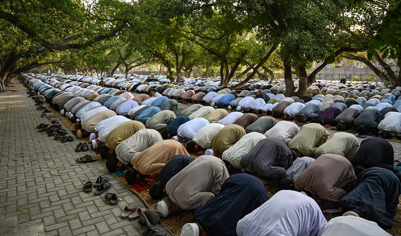 Muslim devotees offer Eid al-Adha prayers in Peshawar on on June 17, 2024. (AFP)