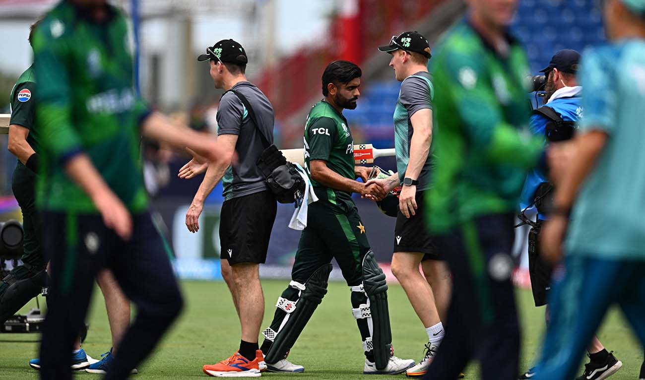 Pakistan's captain Babar Azam shakes hands with other players during the ICC men's Twenty20 World Cup 2024 group A cricket match between Pakistan and Ireland at Central Broward Park & Broward County Stadium in Lauderhill, Florida on June 16, 2024. (AFP/File)