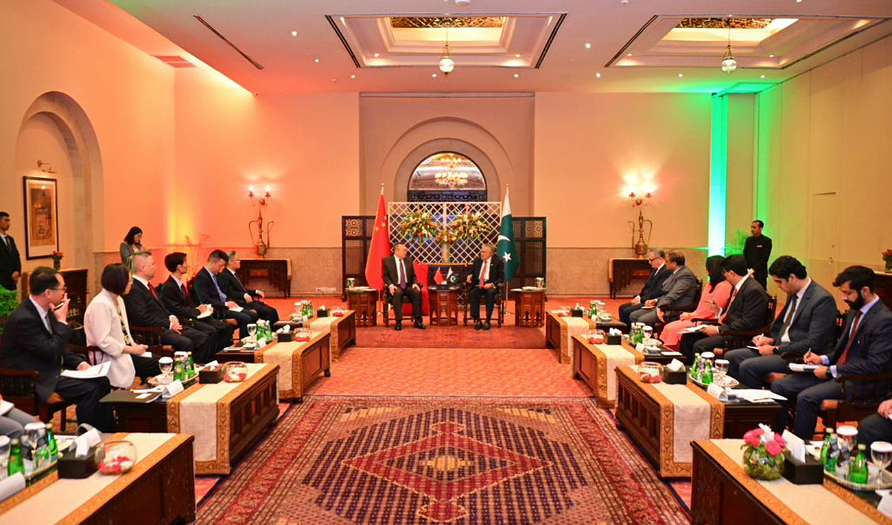 In this handout photograph, taken and released by Pakistan’s foreign ministry, Deputy Prime Minister and Foreign Minister Ishaq Dar (center, right) meets Liu Jianchao, Minister of Central Committee of the International Department of Communist Party of China, in Islamabad on June 21, 2024. (Photo courtesy: MOFA)