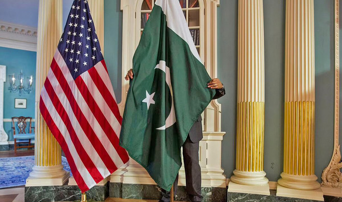 A US State Department contractor adjusts a Pakistan national flag in Washington, US, on February 19, 2015. (REUTERS/File)