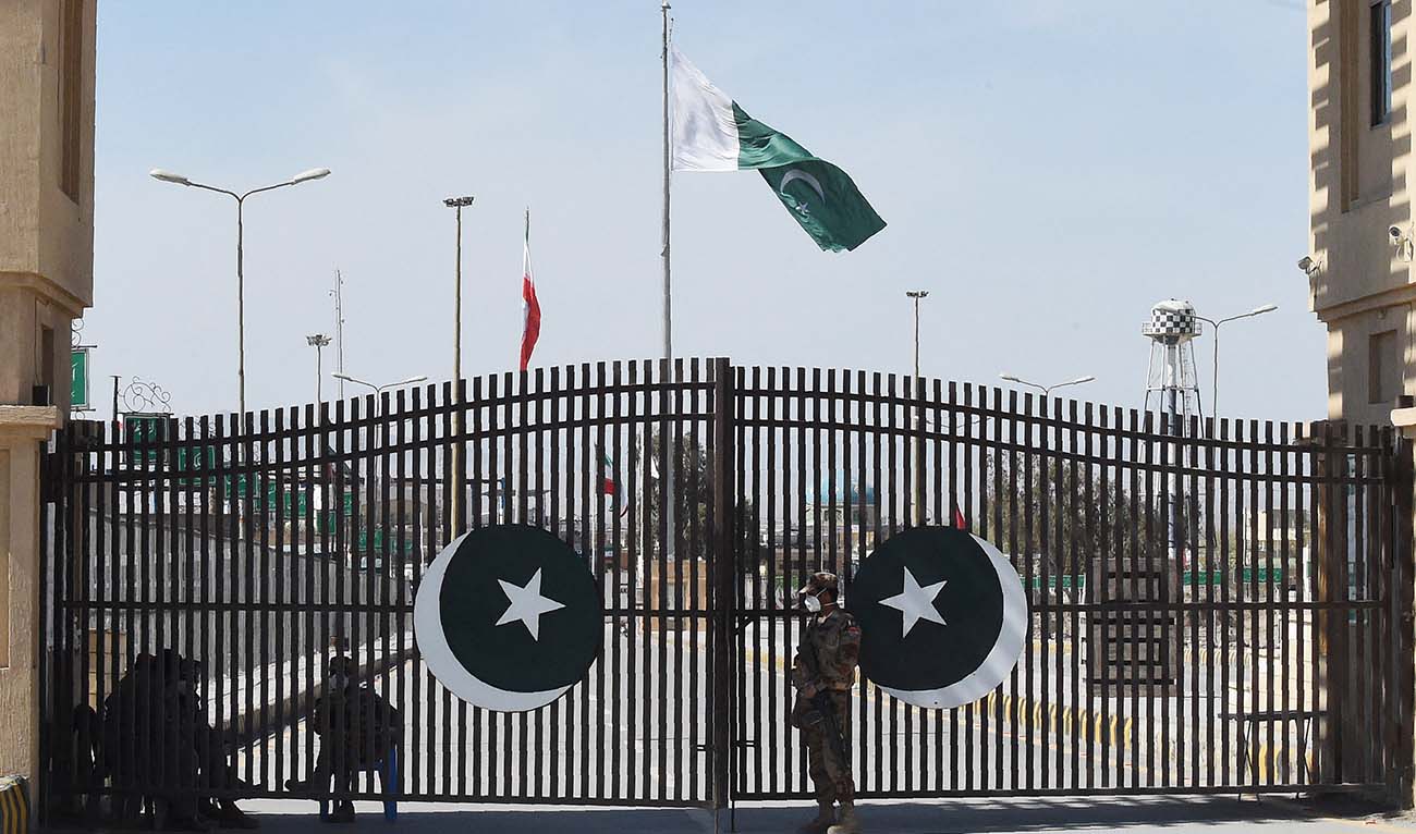Pakistani soldiers wearing facemasks stand guard at the closed Pakistan-Iran border in Taftan on February 25, 2020. (AFP/File)