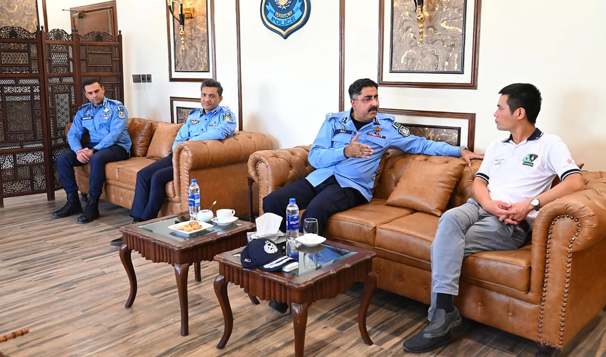 In this handout photograph, taken and released by Islamabad Police, Inspector General of Islamabad Police Syed Ali Nasir Rizvi (second, right) speaks to Vietnam’s Ambassador to Pakistan Nguyen Tien Phong (right) at the office of Islamabad Police Security Division in Islamabad on June 1, 2024, as the capital police found wife of the Vietnamese ambassador hours after she was reported missing by her husband in Islamabad. (Photo courtesy: Islamabad Police)