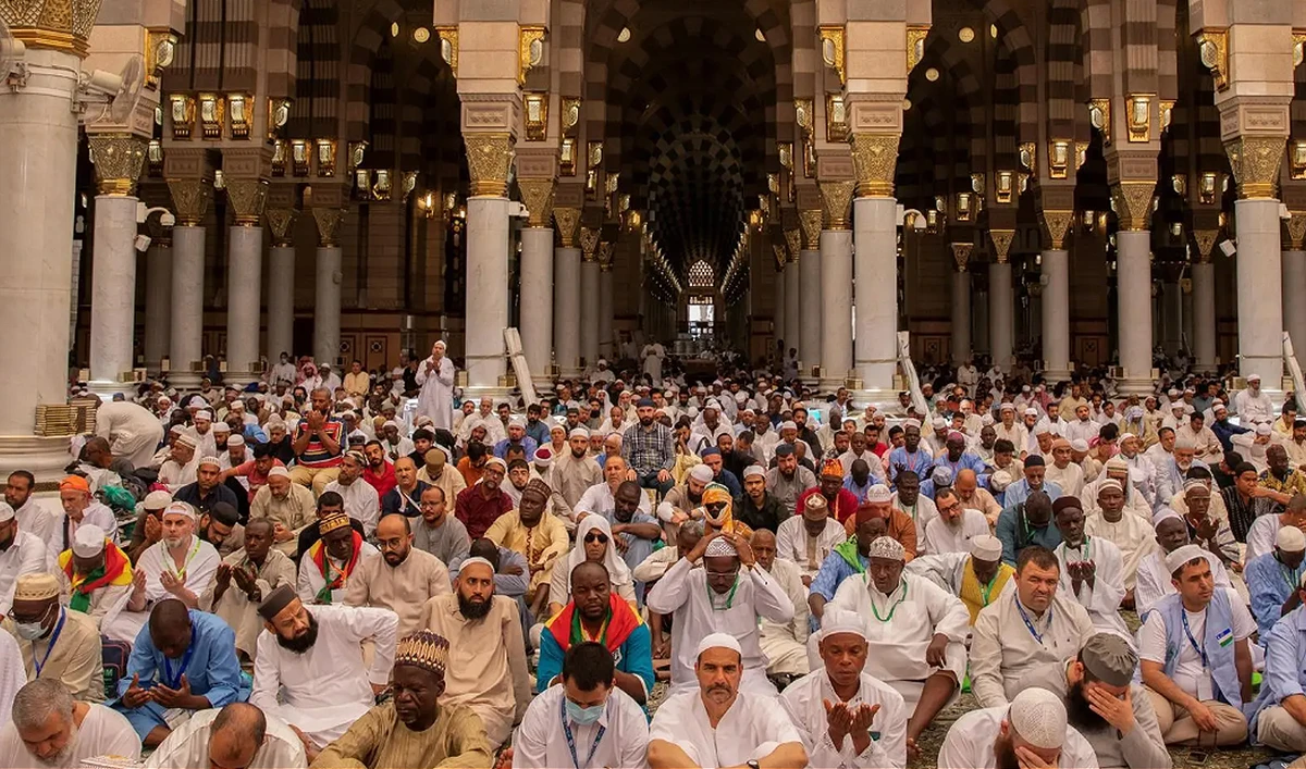 In this handout photograph, taken and released by the Saudi Press Agency, people attend Friday prayers at Prophet’s Mosque in Madinah on June 7, 2024, ahead of annual Hajj pilgrimage. (SPA)
