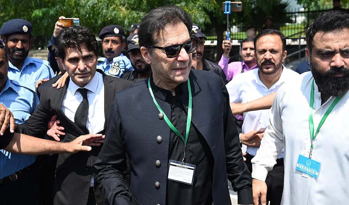 Pakistan’s former Prime Minister Imran Khan (C) leaves after appearing in the Supreme Court in Islamabad on July 24, 2023. (AFP/File)