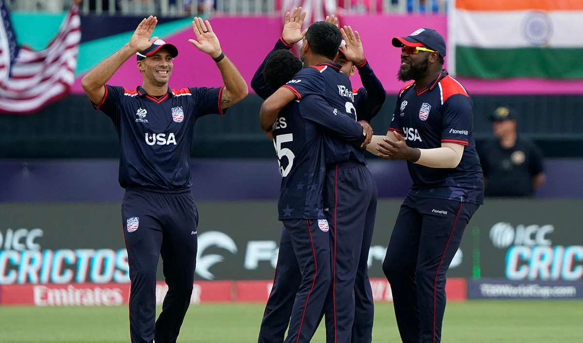 USA celebrates after India’s captain Rohit Sharma was caught out during the ICC men’s Twenty20 World Cup 2024 group A cricket match between the USA and India at Nassau County International Cricket Stadium in East Meadow, New York on June 12, 2024. (AFP)